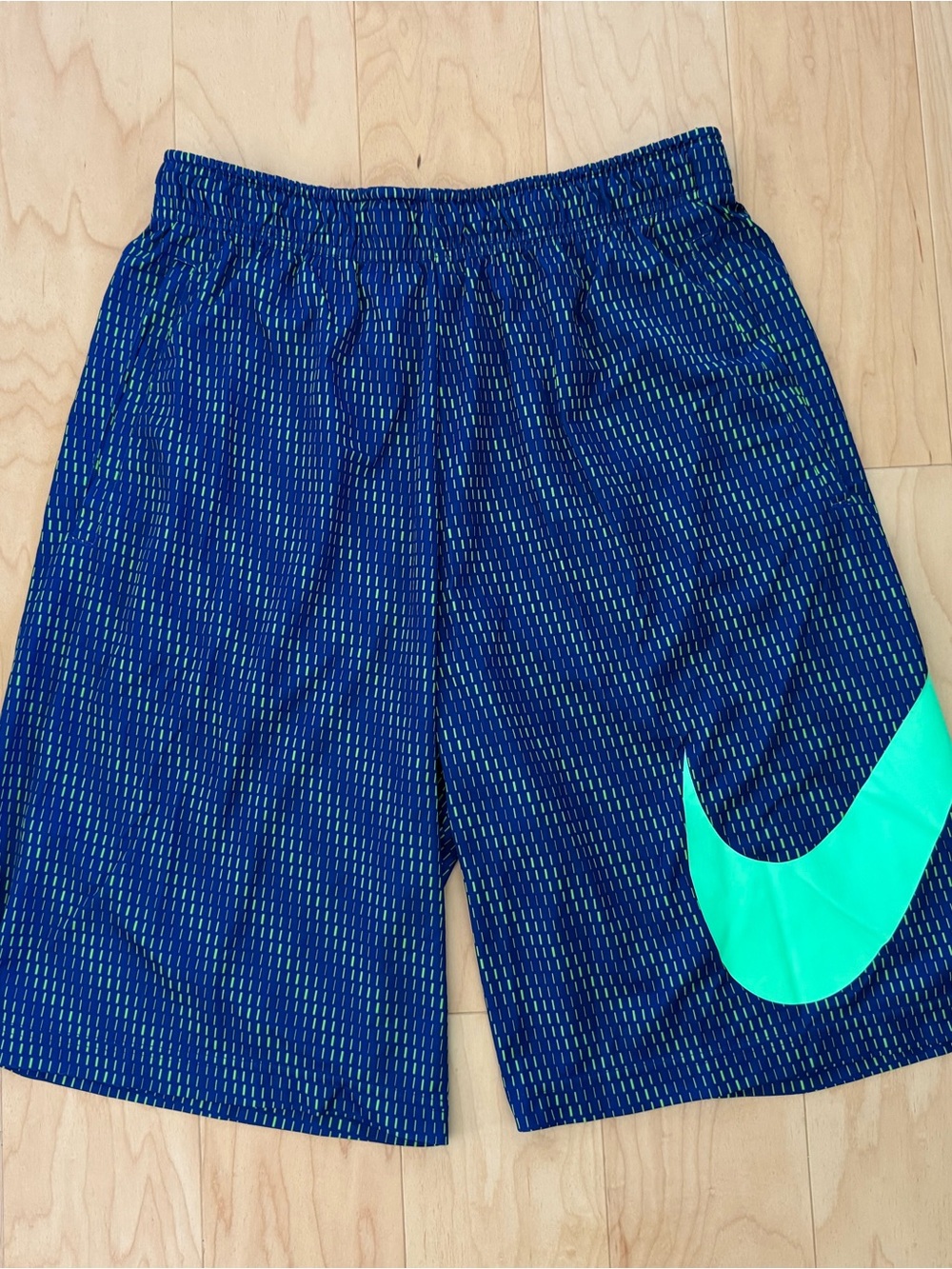 Nike Blue Athletic Shorts with Teal Swoosh sz Large 12 Inch Inseam